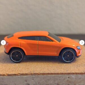 2014 Hot Wheels Orange Lamborghini Urus Diecast Car